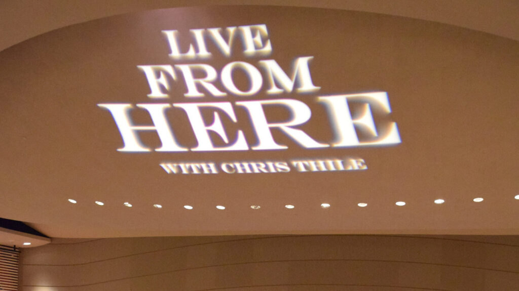 Live from Here with Chris Thile logo projection in Muriel Kauffman Theatre